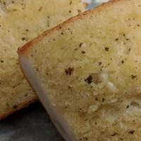 Garlic Bread · Garlic butter Parmesan spread on Italian bread.