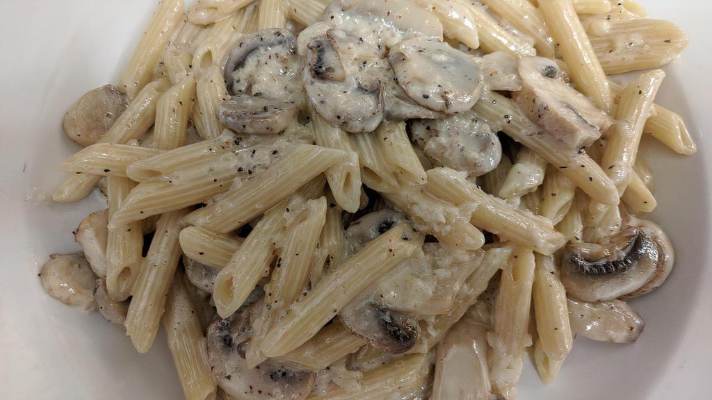 Penne Bianco · Sautéed mushrooms and garlic in a light Parmesan cream sauce, tossed with penne pasta.
