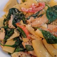 Rigatoni Pollo E Spinaci · Fresh spinach, chicken breast, artichokes, and tomatoes sautéed in olive oil, garlic, and Pa...
