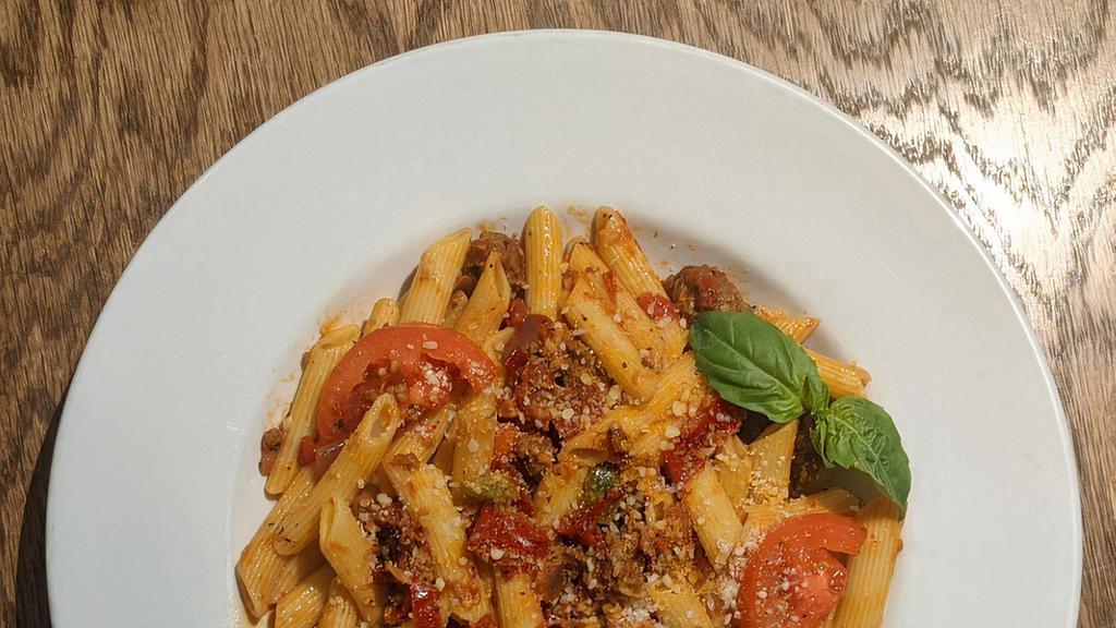 Vodka Arabiata 🔥🔥 · Italian sausage, Calabrese peppers, garlic, vodka, marinara, mushrooms, green peppers, crushed red peppers tossed with penne pasta.  🔥🔥