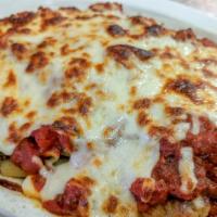 Baked Ziti · Pasta mixed with crumbled meatballs, marinara sauce and topped with Mozzarella cheese.