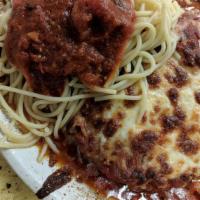 Melanzane Parmigiana · Lightly breaded eggplant baked with marinara sauce and Mozzarella served with a side of spag...