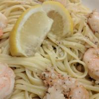 Linguini Con Gamberi · Large shrimp sautéed with olive oil and garlic in a white wine, butter, and lemon sauce, tos...
