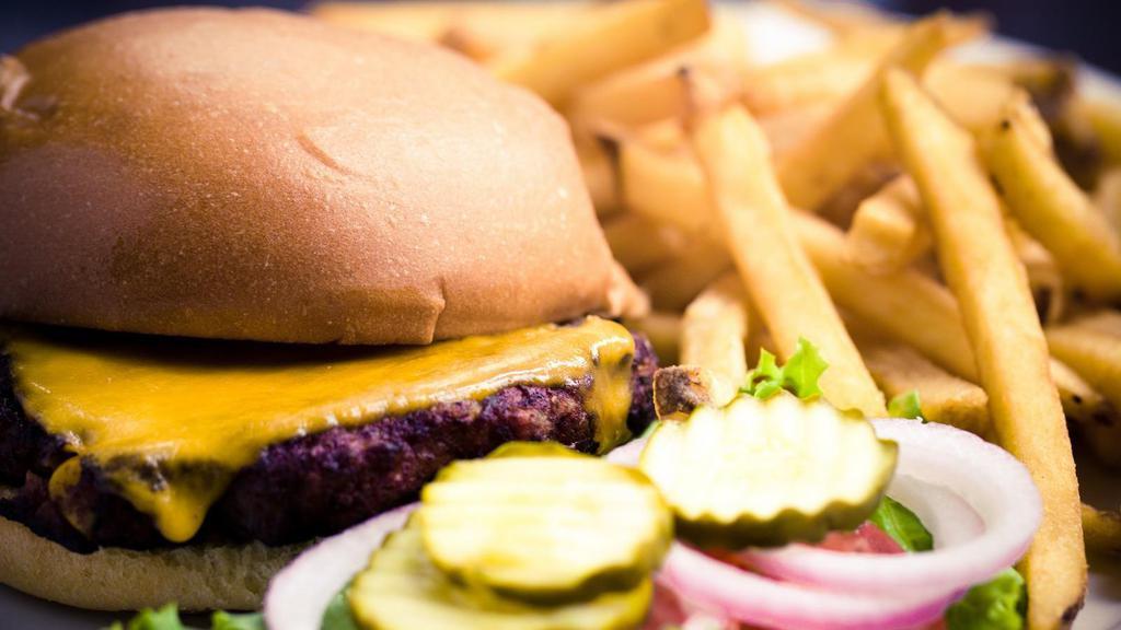 Veggie Burger · A chipotle black bean patty served with cheddar cheese and pesto mayo, plus lettuce, tomato, red onions and pickles on the side. Served with fries.