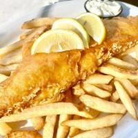 Fish & Chips · Texas-sized beer-battered haddock plank served with tartar sauce and fries.