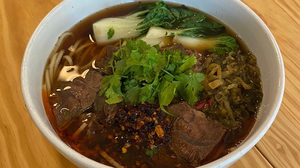 Beef Noodle Soup · beef shank, baby bok choy, preserved mustard greens.