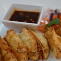 Gyoza · Fried chicken dumplings served with Thai soy sauce