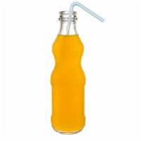 Peach Mango Lemonade Bottle · Peaches and Mangos mixed with lemons made fresh daily and sweetened with agave.