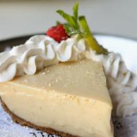 Kelly'S Key Lime Pie · Whipped cream and powdered sugar.
