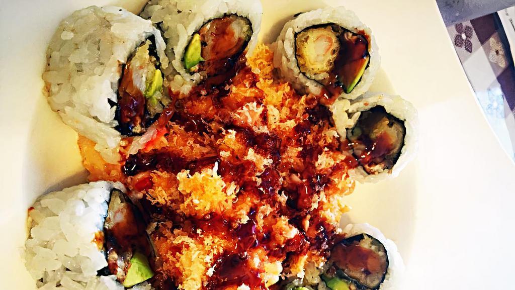 American Dream Roll · Shrimp tempura, eel, avocado roll with crunch crab salad.