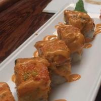 Dynamite Roll · Spicy. Spicy salmon roll topped with spicy salmon.