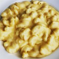 Mac And Cheese · Classic cheddar cheese sauce on cavatappi noodles