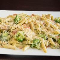 Penne Pollo E Broccoli Pasta · Penne pasta, chicken, broccoli, roasted red pepper, mushrooms, and creamy pesto sauce. Serve...