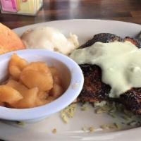 Blackened Chicken · Dredged in cajun seasonings and blackened Louisiana style. Topped with white wine sauce and ...