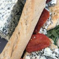 Milonguita Sandwich · Blue cheese, chicken, sun dried tomatoes, arugula on Demi baguette