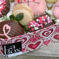The Sweetheart Box · The Sweetheart Box consists in six  chocolate-covered strawberries, macarons and a rose on t...
