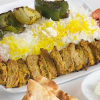 Beef Shish Kabob · Chunks of prime beef with grilled tomato, onions and green pepper...

served with Rice,Bread...