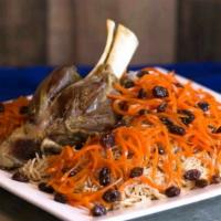 Qaubili Pulao With Lamb Shank · TENDER CHUNKS OF LAMB SHANK UNDER DELICIOUS SEASONED RICE TOPPED WITH FRIED SWEET CARROT STR...