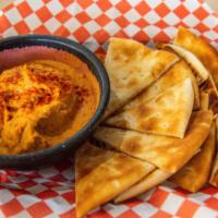 Roasted Red Pepper Hummus · Served with Greek pita bread.