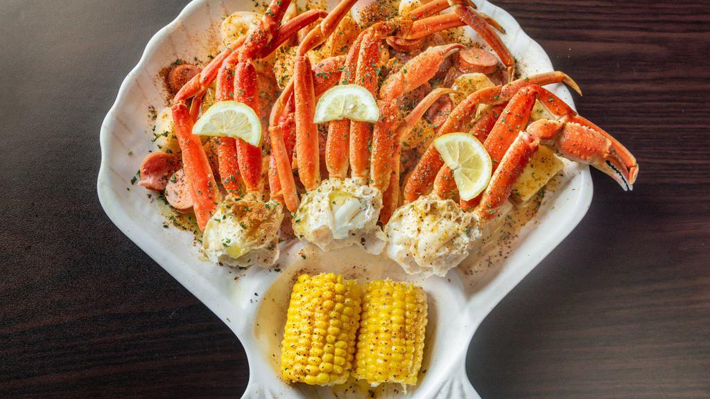 Big Island Silver · Three snow crabs, 12 shrimp, two sausages, two corns, potatoes.