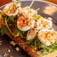 Egg Toast · toast ciabatta bread with hard boiled egg + avocado + arugula + feta cheese.