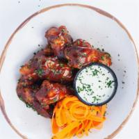 6 Bbq Wings · baked to perfection then tossed in a tangy and sweet BBQ sauce served with a side cilantro b...