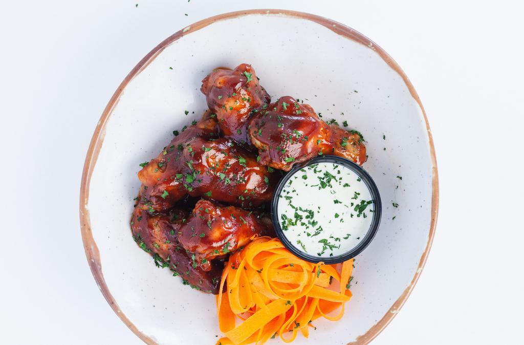 6 Bbq Wings · baked to perfection then tossed in a tangy and sweet BBQ sauce served with a side cilantro bleu cheese ranch to dip.