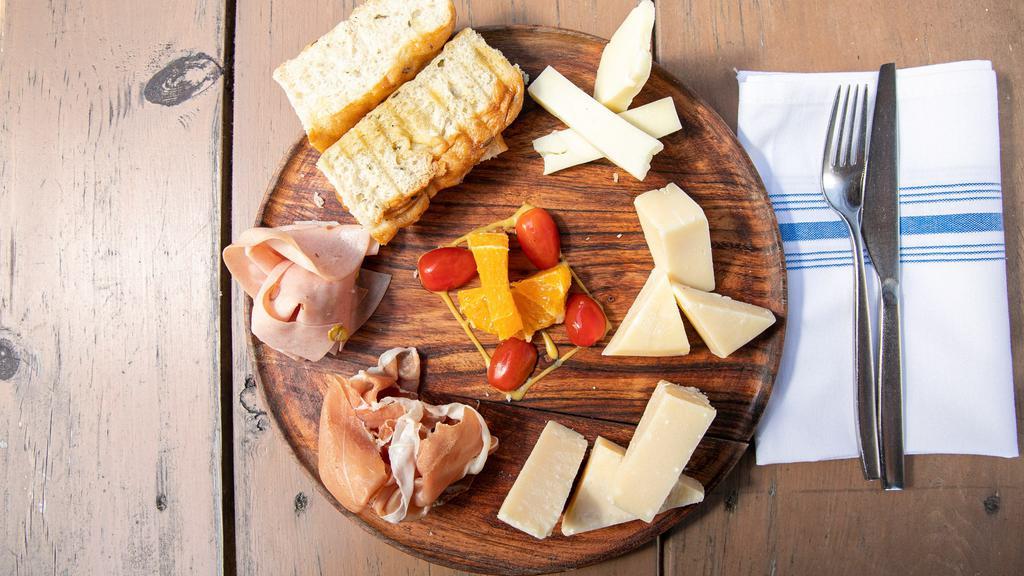 Plater Of 3 Meats And/Or Cheeses · Your choice of any combination of 3 of our available cold cut meats and/or cheeses.  Served with three pieces of our artisanal focaccia. (Servers 1-2 people as an appetizer).