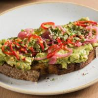 Smashed Avocado Toast · avocado, pickled shallots, pepitas, sesame seeds, and pickled chilies on sourdough