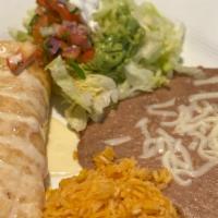 Chimichanga · Choose chicken, ground beef or shredded beef stuffed in a flour tortilla, fried to a golden ...