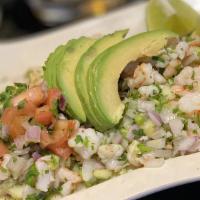 Ceviche · Premium tilapia cured in lime juice and fresh spices.