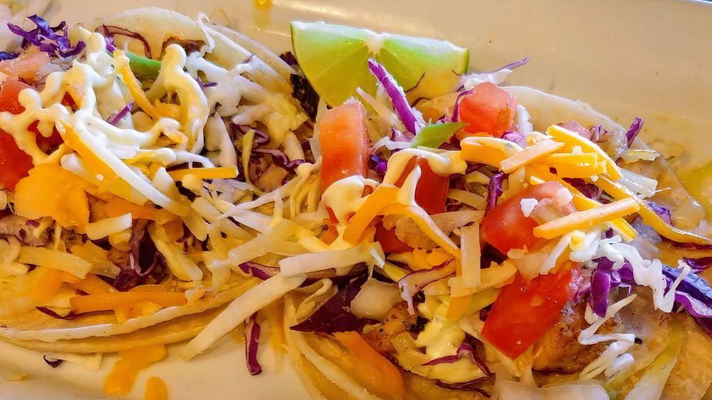 Fish Tacos
 · 3 tacos filled with choice of rockfish18. Served on soft corn tortillas, fresh cabbage, EL secret sauce, cheese tomatoes, and onions.