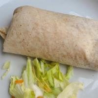 Burrito · Your choice of meat or veggie with Refried beans, rice, and cheese wrapped up in a flour tor...