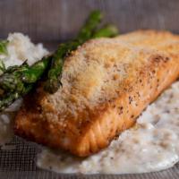 Family Meal Seared Salmon · Pan seared 8oz Salmon filet seasoned with citrus and thyme. Finished with a parmesan crust a...