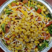 Bowl · This does not include French fries. White rice, lettuce, sour cream, corn, cheese, pico de g...