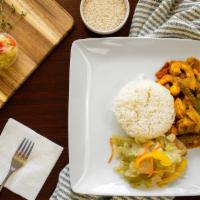 Jerk Shrimp · Served with rice, vegetables and plantains