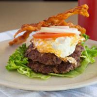 Paleo Plate · 2 burgers, fried egg, bacon, served on a bed of lettuce, tomato, and onion. Does not include...