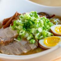 Braised Pork Ramen · Braised Berkshire pork loin with bok choy, scallions, and Japanese egg noodles.