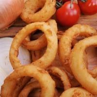 Onion Rings · Beer battered onion rings served with our signature dipping sauce.