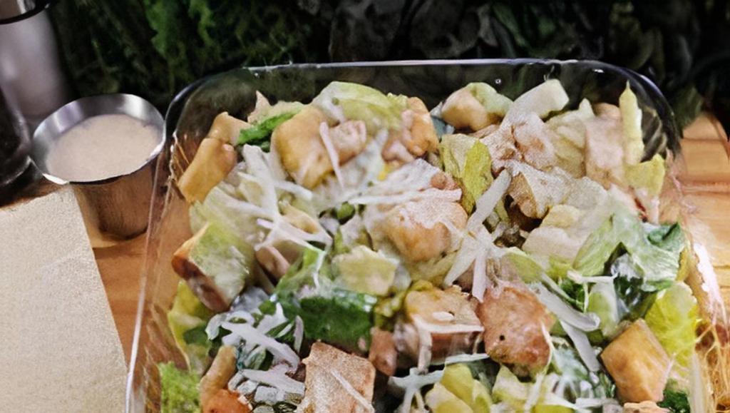Caesar Salad · Lettuce, tomato, parmesan cheese, croutons and Caesar dressing.