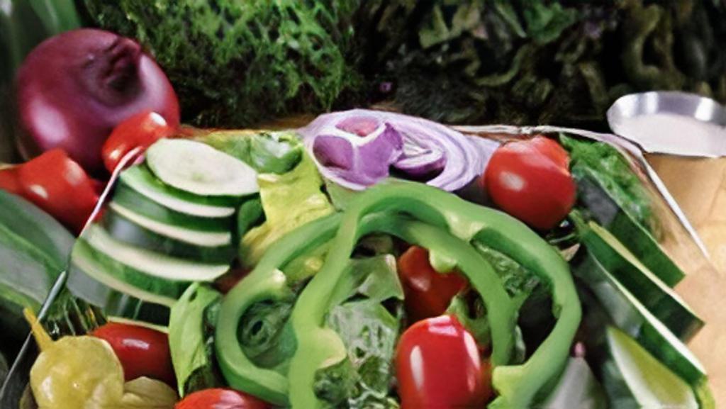 Garden Salad · Lettuce, tomato, red onions, cucumbers, green peppers, pepperoncini, choice of dressing.