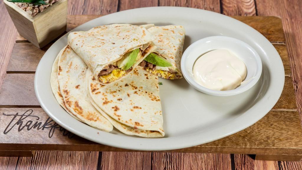 3 Pieces Baleadas · Flour tortillas stuffed with eggs, cheese, beans, sour cream and avocado. Served with a choice of protein.