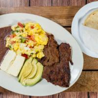 Desayuno Campestre · Two eggs any style served with spicy sausage, cheese, avocado, fried beans and tortillas.