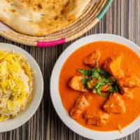 Butter Chicken · Butter chicken comes with one bread and Rice .