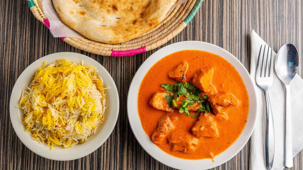 Butter Chicken · Butter chicken comes with one bread and Rice .
