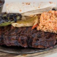 Fajita Dinner For 4 · Choice of beef, chicken or combo fajitas.  Served with fresh tortillas, Mexican rice, refrie...