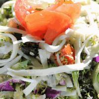 Chopped Salad · Chopped broccoli, red cabbage, tomatoes, olives, garbanzo beans & mozzarella cheese served w...