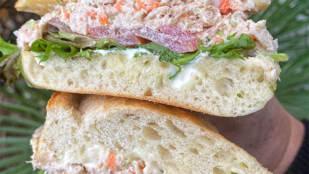 Albacore Tuna Sandwich · Albacore tuna salad, mixed greens, tomatoes & mayo