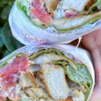 Chicken Caesar Wrap · Grilled chicken breast, parmesan cheese, romaine lettuce, tomatoes & our caesar dressing wra...