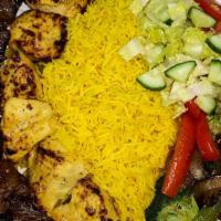Tasty Grill To Go Special · Beef kebab and chicken kebab served with our special sauce, basmati rice, sautéed veggies, a...